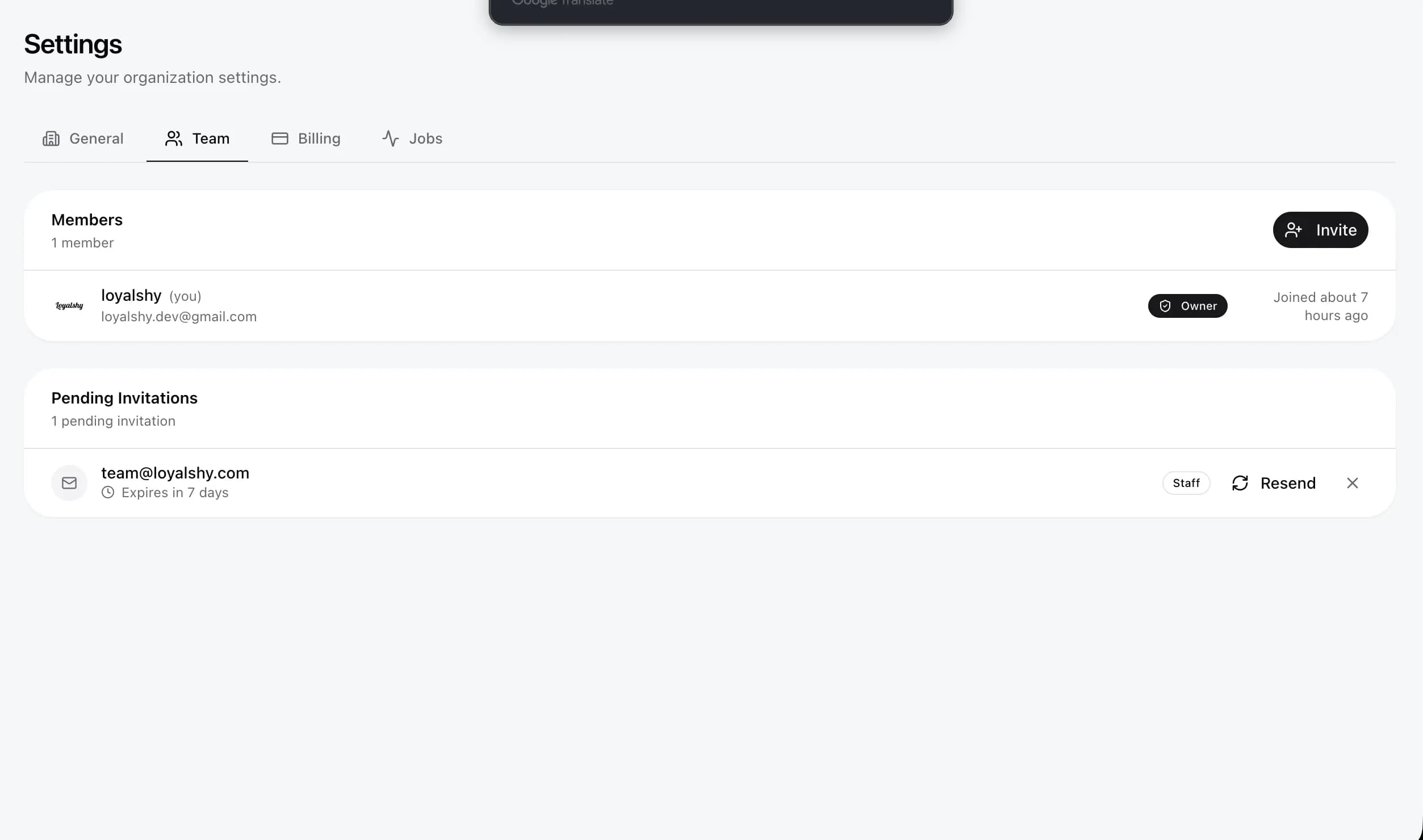 Team settings showing members with roles and invite button